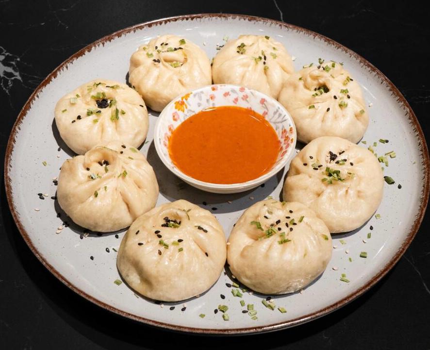 Vegetarische Momos mit Spinat, Kartoffeln, Weisskohl und Käse